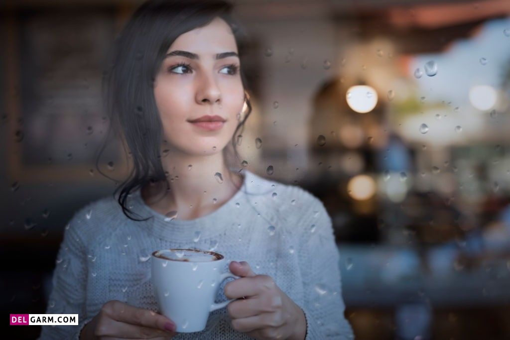 عکس باران و پنجره