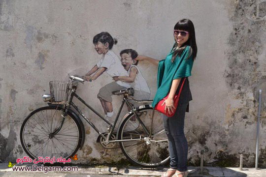 تصاویری از نقاشی دیواری هنرمندانه از هنرمندی در مالزی