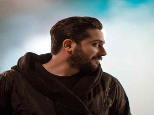 دانلود آهنگ جدید روزبه بمانی گلوله خوردن با کیفیت اصلی + متن ترانه