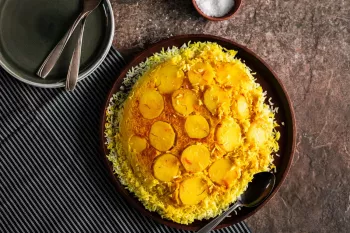 دستور پخت ته دیگ سیب زمینی به صورت رنده شده