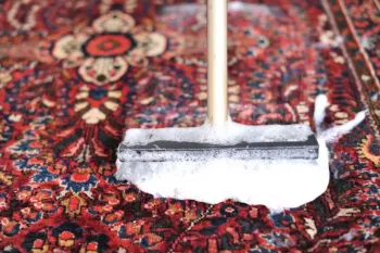 تطهیر فرش یا لباس نجس با آب کر