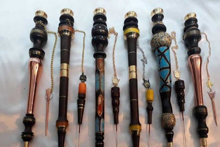 تریاک کشی کودک 3 ساله برای تبلیغ فروش وافور